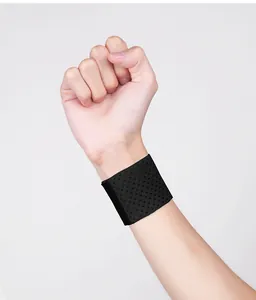 Close-up of a breathable mesh sports wristband for compression and protection.