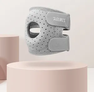Primer plano de la codera de compresión gris AOLIKES con diseño de malla transpirable