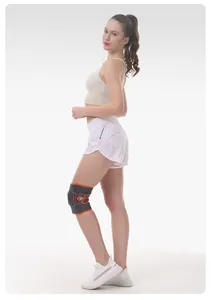 Detail side view of professional sports knee brace with dual spring support on model