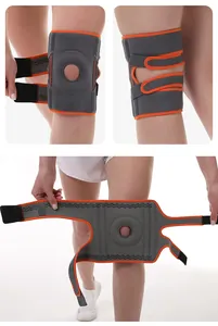 Adjustable sports knee brace with patella cutout and supportive orange piping.