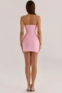 Back view of elegant pink strapless bandage mini dress with vertical zipper detail