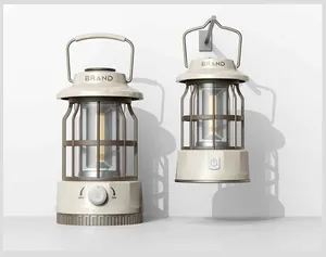 Doppia vista di lanterne da campeggio a LED portatili color crema, in piedi e appese