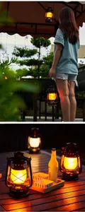 Lanterna da campeggio a LED vintage con luce calda in una bella scena all'aperto.