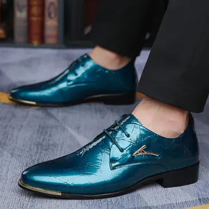 Close-up of metallic blue Derby shoes with textured finish and gold metal accents