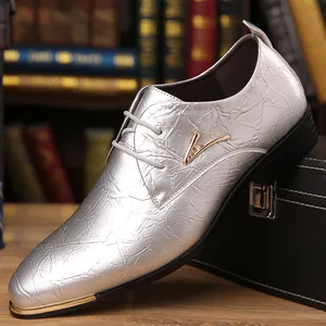 Side detail view of silver textured leather men's Derby dress shoe with gold metal accent