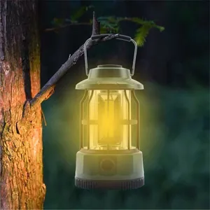 Portable retro COB camping lantern hanging on a tree branch for outdoor atmosphere