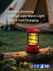 Portable red LED camping lantern with warm COB light on wooden log