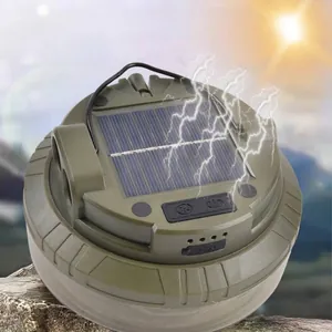 Green solar powered portable camping lantern with hook for outdoor hiking and tent lighting