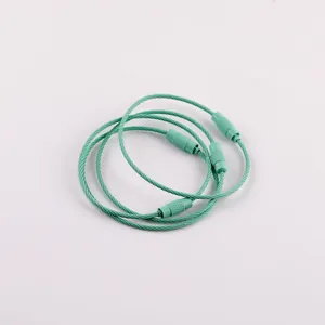 Set of four green painted steel wire rings with screw locks for DIY keychains.