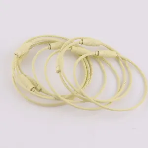 Cream colored painted steel wire rings with screw connectors for DIY keychain accessories.
