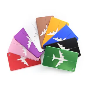 Set of colorful aluminum luggage tags with airplane cutout design in multi-color finish.