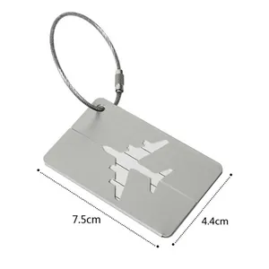 Detail of silver aluminum luggage tag with airplane cutout and 7.5cm dimension