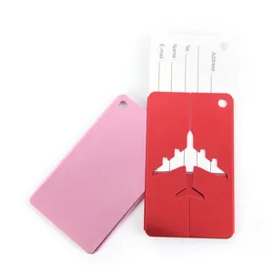 Detail of aluminum airplane luggage tag with insertable information card