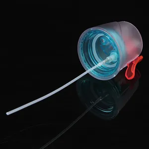 Detailed macro view of the blue translucent mist spray bottle cap with long straw