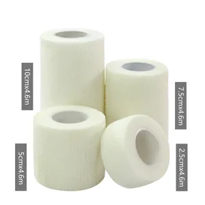 White non-woven self-adhesive elastic bandages in four different width sizes.