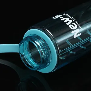 Macro view of blue plastic sport spray bottle neck and printed measurement marks