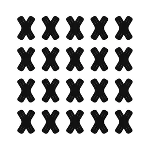 Detail view of twenty black X-shaped kinesiology tapes arranged on white background