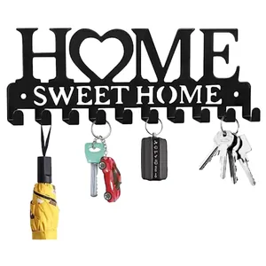 Επιτοίχια κλειδοθήκη Home Sweet Home από μαύρο μέταλλο με γάντζους οργάνωσης σπιτιού