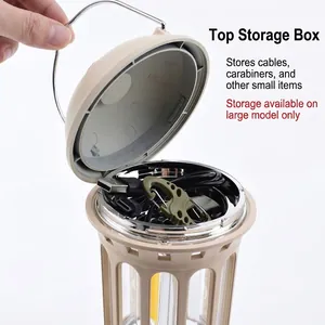 Retro style outdoor camping lantern with a top storage compartment for cables and hooks