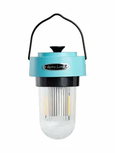 Vintage portable cyan LED camping lantern featuring a fluted clear shade and metal handle