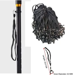 Détail d'une dragonne de canne en nylon tressé noir avec dimensions précises et claires