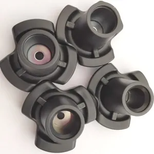 Detailed macro view of four black durable anti-slip rubber tips for underarm crutches.