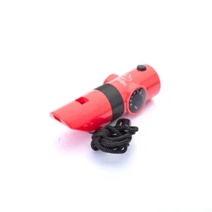Close-up of red 7-in-1 survival whistle showing integrated thermometer and LED light