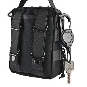 Detailed view of black tactical pouch with retractable carabiner and key clip attachment.