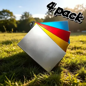Set of 4 multi-colored aluminum metal RFID blocking cards on green grass
