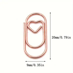 Primo piano di una graffetta a cuore oro rosa con dimensioni di 20 mm x 9 mm dettagli.