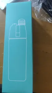 Teal minimalist gift box for a portable outdoor cooling spray water bottle detail view