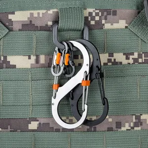 Detail view showing durable metal S-shaped carabiners attached to tactical backpack webbing
