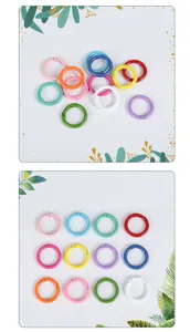 Anillos de resorte de aleación de zinc de colores dispuestos en una rejilla ordenada