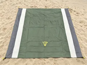 Large portable waterproof sandproof outdoor beach mat in green white and grey colors