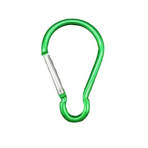 Detailed view of a green bulb-shaped aluminum alloy carabiner with spring gate