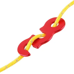 Close-up of a red aluminum S-shape rope tensioner used with a yellow reflective cord.