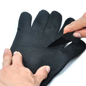 Detail view of level 5 cut resistant gloves during a durability test with a knife