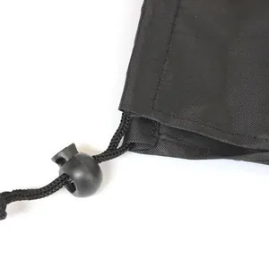 Black Oxford cloth drawstring storage bag for trekking poles detail view and texture