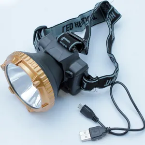 Rechargeable LED fishing headlamp with black and gold design and USB charging cable