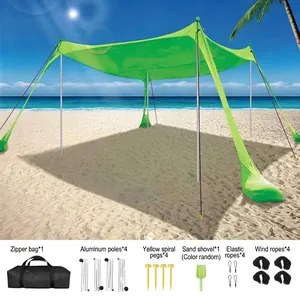 Portable green Lycra beach sunshade tent set with aluminum poles and complete accessory kit