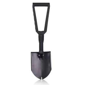 Black folding entrenching tool with serrated edge and D-handle on white background