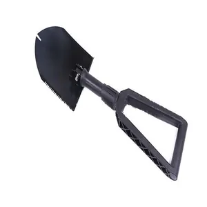 Detailed macro shot of a black folding multi-functional entrenching shovel with serrated edge