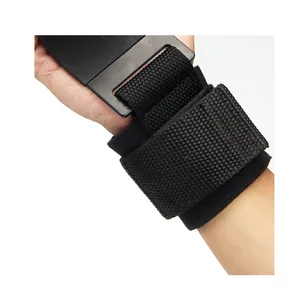 Detailed close-up of heavy-duty weightlifting power hook and padded wrist strap on arm