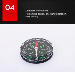 Detail macro view of a 4.5cm compact navigation compass for outdoor hiking and camping