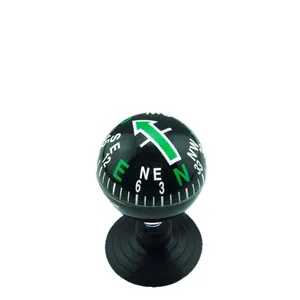 Compact 38mm car compass with suction cup mount for dashboard or outdoor use.