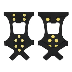 Detailed view of 10-stud ice cleats featuring black rubber and yellow non-slip spikes