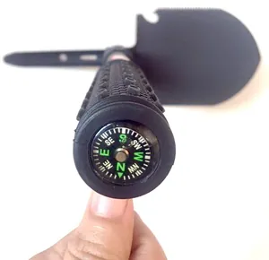 Detail view of the multi-functional folding camping shovel handle with built-in compass