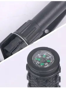 Close-up of the built-in compass and non-slip handle on a survival folding shovel