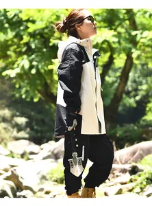Multifunctional folding manganese steel shovel shown in outdoor camping scenario