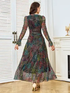 Back view of an elegant floral maxi dress with shimmering rhinestone details for parties.